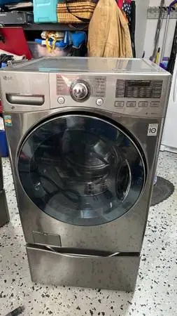 LG washer and dryer on pedestals