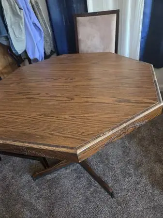 42 inch table with 3 chairs.