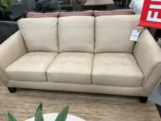 BEIGE LEATHER SOFA....