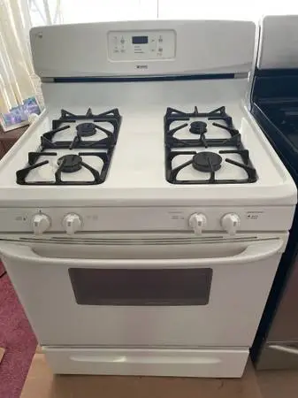 ### KENMORE WHITE STOVE WITH SELF CLEANING ###