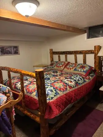 Queen size rustic pine log bed