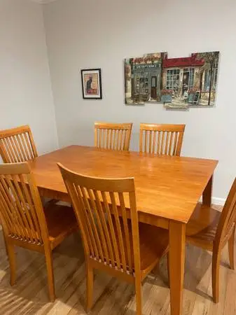 Wood expandable dining table & chairs.