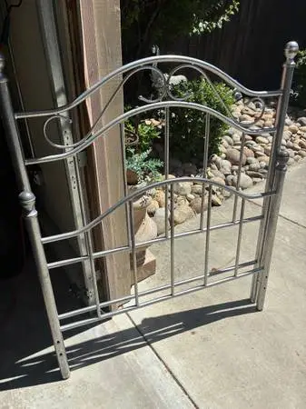 Twin Iron headboard and footboard.