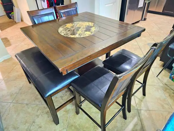 Break table and 4 chairs and 1 bench