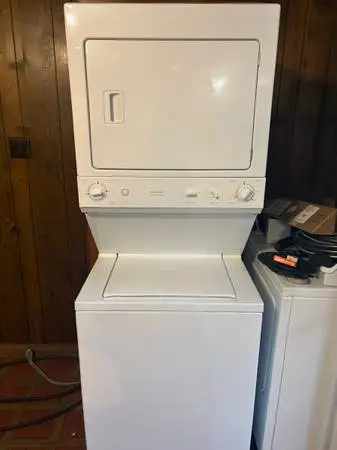 LIKE NEW GE 27 in stack, washer Electric dryer
