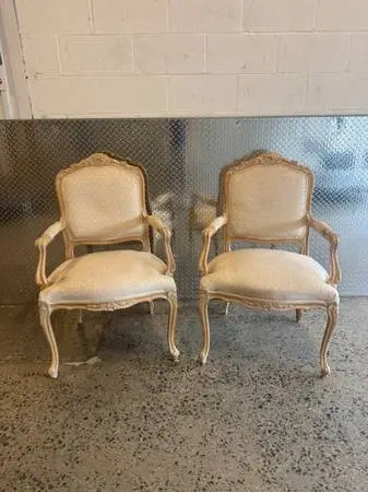 Pair of Vintage French whitewashed arm chairs