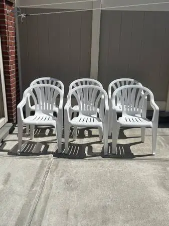Grosfillex® Resin Stacking Outdoor Armchair in White (Quantity 6).