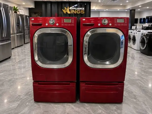 Red LG Washer & Dryer sets on pedestals