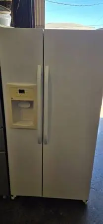 G.E 22 CU.FT SIDE BY SIDE REFRIGERATOR WARRANTY N DELIVERY