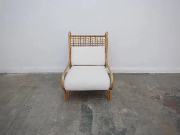 CB2 Ouen Rattan and Boucle Lounge Chair $599.00 27 W x 35 D x 36 H