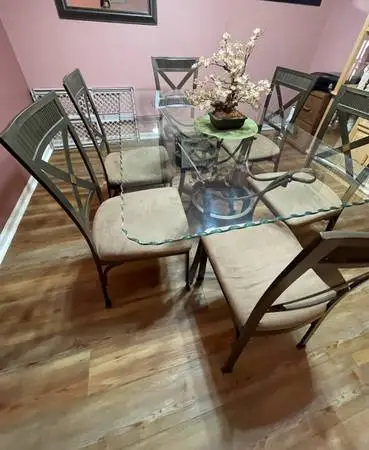 Elegant glass top dining table and 6 chairs