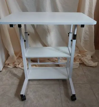 NEW - Cute little lightweight rolling table/desk - top is 24x15.5