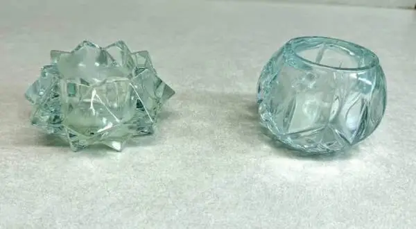 2 Crystal candle holders with brand new candles