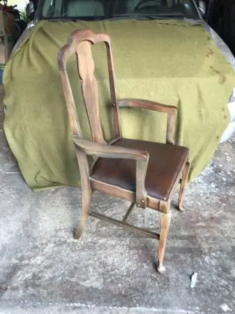Antique Solid wood captains armchair.