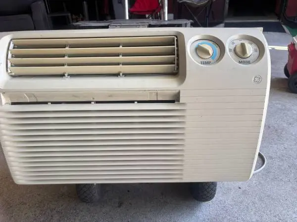 GE AIR CONDITIONER 12000 BTU WALL 220 SLIDE OUT