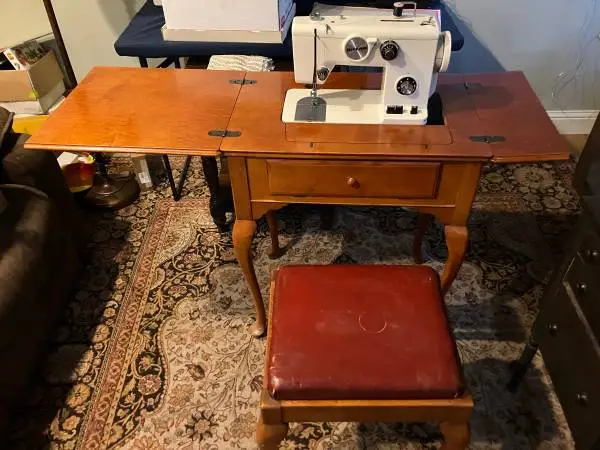 Vintage Sewing machine Riccar 777 in cabinet with matching stool