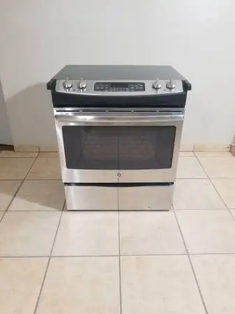 Stainless steel GE Electric stove 5 Burner And Conventional oven