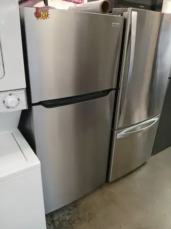 New Frigidaire stainless steel top freezer refrigerator