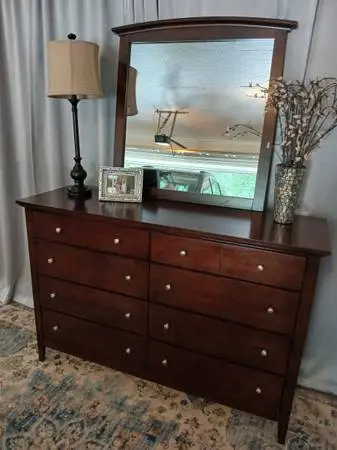 Beautiful wood hightop tripple dresser and mirror,  58x18x33tall