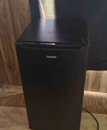 Mini fridge and glass top tv stand