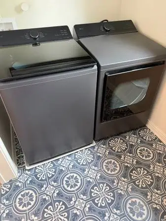 LG 5.5 Cu. Ft. Top Load Washer and 7.3 Cu. Ft. Electric Dryer with AI