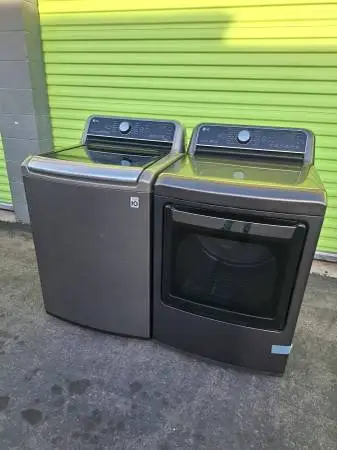 Lg grey smart top load washer and gas dryer