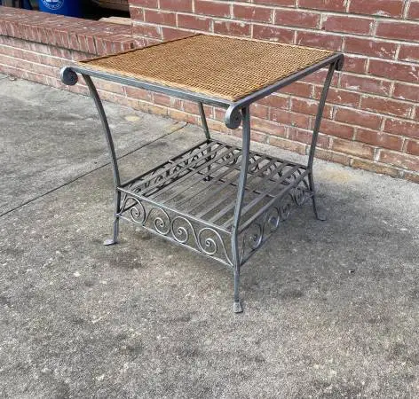 Beautiful High-End Table. Heavy, solid metal base. Wicker top.