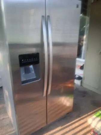 Side by side stainless steel refrigerator