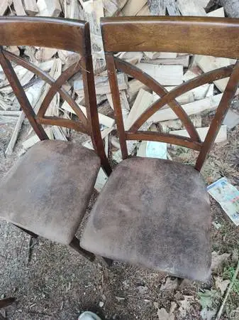 2 older leather hardwood chairs