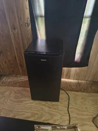 Mini fridge and glass top tv stand
