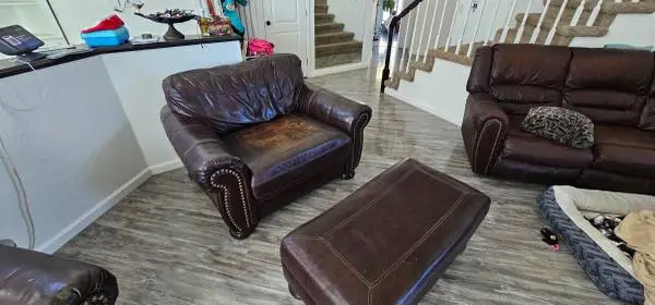 Leather Chair and a Half + Ottoman · Oversized Brown Leather Armchair