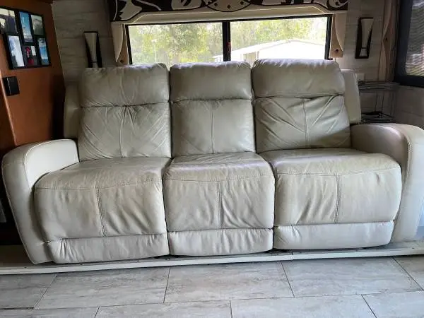 Leather sofa with Power Recliner on both ends
