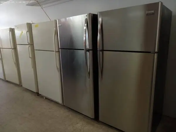 Top freezer refrigerators