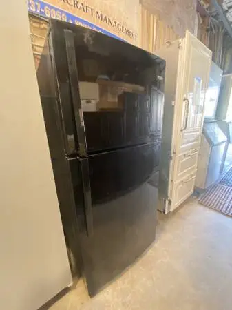Black Whirlpool Top Freezer Refrigerator Model #WRT519SZDB02 Used