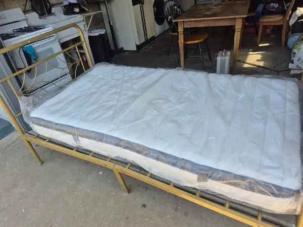 Twin bed frame and like new mattress