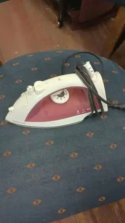Electric steam iron has been tested works great in very good condition its guar