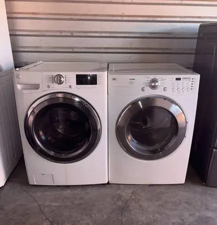 White Kenmore Washer And LG Gas Dryer