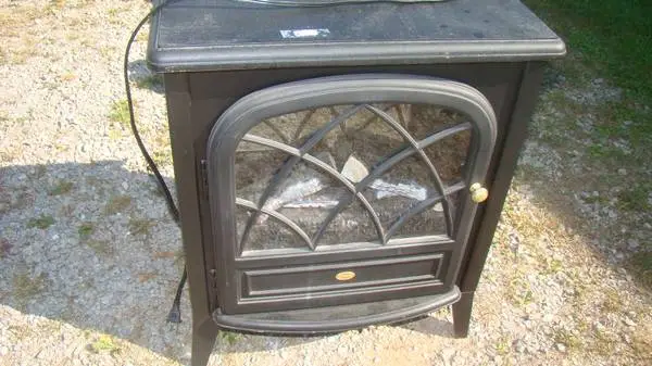 ELECTIC   FIRE PLACE HEATER