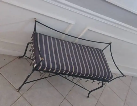 Black wrought iron padded foyer bench