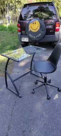 Nice glass top computer desk with chair