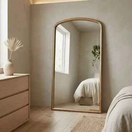 Large gold arched mirror
