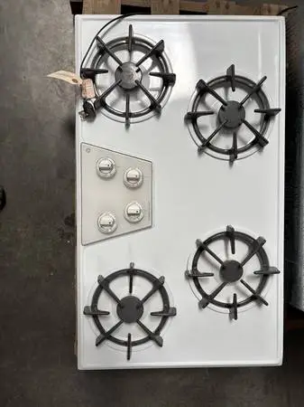 GE gas cook top and Frigidaire gas oven white porecelain