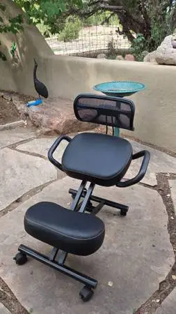 Black adjustable sit/kneel office chair