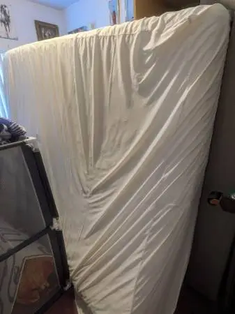 King Size Mattress, 2box springs, frame and headboard. Great condition