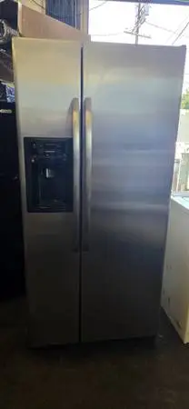 G.E STAINLESS 22 CU.FT SIDE BY SIDE REFRIGERATOR WARRANTY N DELIVERY