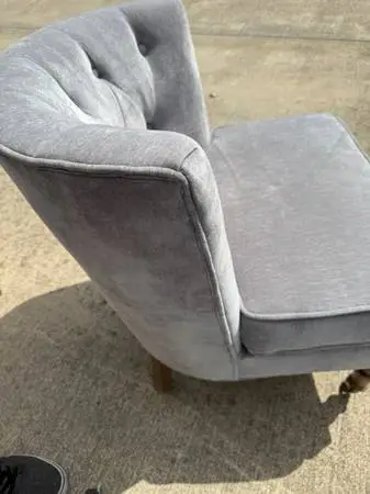 Gray velvet sleeper chair.