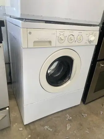 White GE Front Load Washer SS Interior Model #WSXH208A1WW Used