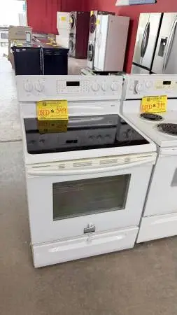 GLASS TOP ELECTRIC STOVE PRE OWNED.