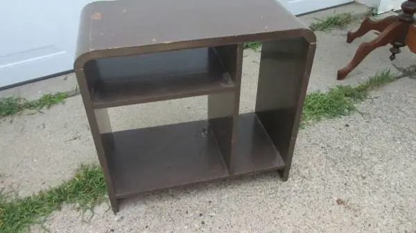 small solid wooden shelf painted brown