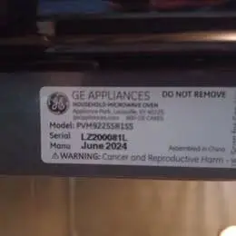GE Profile Over-the-Range Microwave. CASH ONLY